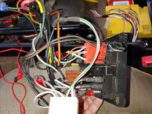 Just to show the scale/amount of wire they used while doing this botch job.  Ignore small red wire with red tape.  Was for a previous mickey mouse wiring that I removed, and later removed the wire.