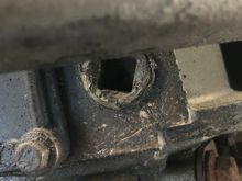 Cross member just barely cutting off access to the drain plug on the transfer case. 