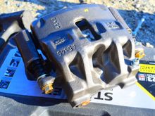Needed a new front driver caliper in a hurry. TRW caliper complete with Lucas caliper bracket.