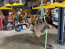 I hung the diff from the car, removed the trans jack, then lowed the car to set the diff on the ground.