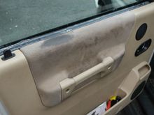 Before I replaced the window regulator, I held the window up with duct tape, so there's damage and wear