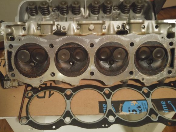 Cylinder head and gasket just after removal from block