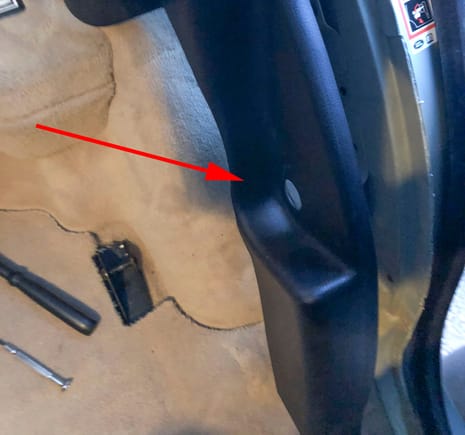 Remove seatbelt bolt using torx bit.
