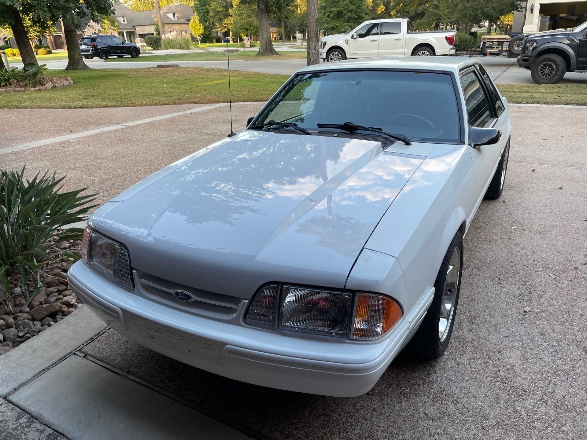 The color of the car is Ford Oxford White.  The front fender is the actual color.  I painted the engine bay before I did my LS376/480 swap and I had Oxford White mixed at my local paint and body supply store so I know the color and this hood isn't the color!