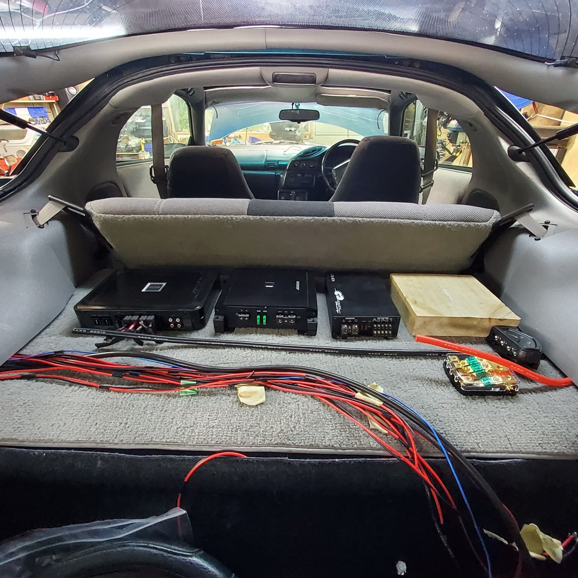waiting on the DSP.. before I can do the install... The connection from Alpine head unit to DSP is optical - so that eliminates noise. The DSP earth is on the opposite side - rear seat belt bolt - nice an quiet - no major draw on that side. 