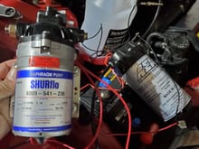 I tested both to make sure they work and pull fluid and spray it. both worked good. the shurflow can be a stand by incsse the Aem fails and i need a temp backnup. 