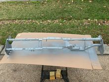 I had a full can of grey spray paint so on it went.