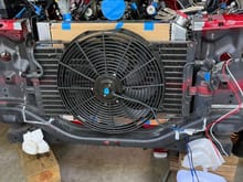 Pusher fan temporarily mounted to AC condenser.  Fits for now, with grill.  That means AC may be in the mix earlier than later.  We’ll see.