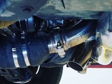 Passenger side wastegate and exhaust exit