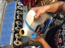 Adding a five quarts of oil for the prelube and giving the valve train a good bath.