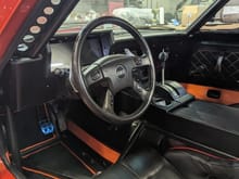 The interior was my job. Mark let me do what I wanted. From carpet to headliner. The center console is made of mdf. The Holley Dash has a 3D printed surround with a black vinyl wrap and carbon fiber trim. The Shifter knob is a 3D printed test piece that's now permanent. We used the TrailBlazer steering wheel. The buttons on the wheel control a custom heater/defroster. 