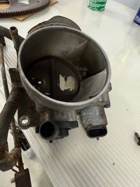 this is what the sensors look like before i cleaned the throttle body