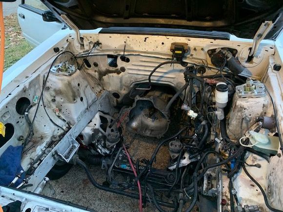 This is what the engine compartment look like when I bought the car.