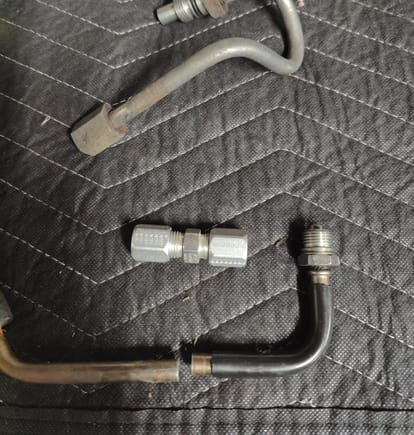 Stock mustang power steering line and GM truck tube with a swage fittings. Just need the pressure reducing kit and power steering will be done. 