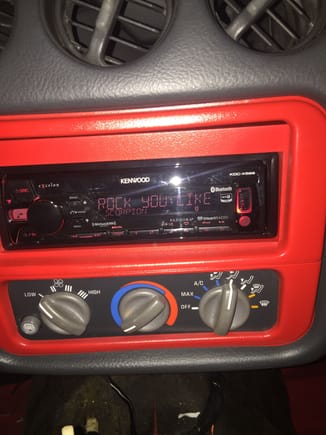Radio installed with color matched bezel. SIMS plastic paints did the job nicely.