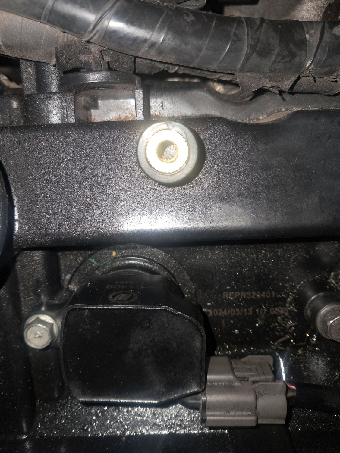 The scew on #4 just turns, i can pull the coil and scew up with the insert at this moment, im just not sure how to remove or install a new screw insert. That is the insert for the engine cover, the gold peice, i need one for the ignition coil.