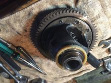 Rear (bell housing side) diff bearing removal. Not easy, since the speedo gear was on the way. You can see the lip got busted. Had to create different “lip” for the gear puller to grab on.