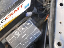Connector behind driver headlight (has orange/black ,black wires that someone mentioned in another post) but doesnt seem like it would be long enough to reach fogs and there is no identical plug in same general are on passenger side