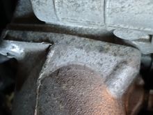 Sorry about the bad pic. This is the other side of the stock throttle-body. I just bought a new Hitachi 70mm throttle body i still have to install. I guess this is where the spacer kit would mount? 