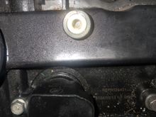 The scew on #4 just turns, i can pull the coil and scew up with the insert at this moment, im just not sure how to remove or install a new screw insert. That is the insert for the engine cover, the gold peice, i need one for the ignition coil.