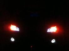 Parking Lights ON. Aftermarket projector headlights and fog lights. 
Features:

H1 low beam (not shown)
H1 high beam (not shown)
H3 fog lights (not shown)
LED Eyebrow
LED Halos
Solid Low beam LEDs (not shown)
1157 Parking Lights