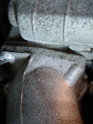 Sorry about the bad pic. This is the other side of the stock throttle-body. I just bought a new Hitachi 70mm throttle body i still have to install. I guess this is where the spacer kit would mount? 