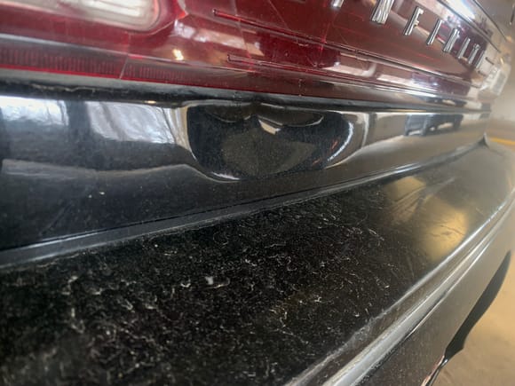 trunk lid damage close up 1