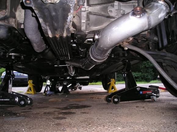 under car view of exhaust(right) and turbo feed pipe(left)