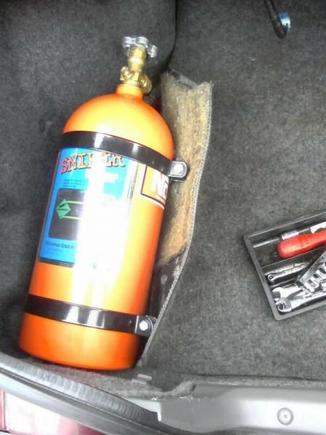 Nitrous set up is complete, just need to find a way to mount the bottle a little cleaner. It's bolted in here but the carpet is up like so---->