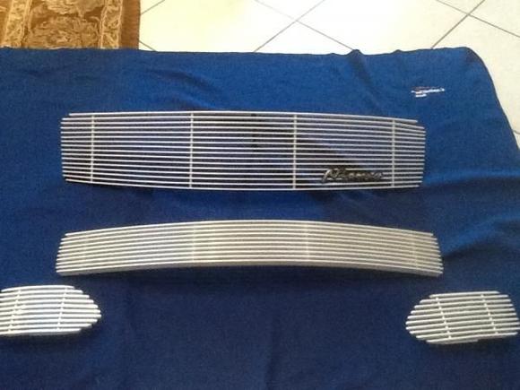 Customized 4 piece aluminum billet grille painted to color match winter frost OEM paint code. Sorry for grainy pics. High res coming soon