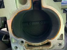 89k on this throttle body- make sure you remove all the sensors before you clean it.  Just a rag toothbrush and throttle body cleaner.  Take a razor blade to remove any deposits for a good seal to new gasket