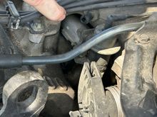 I don’t know the correct terminology, but it comes off the top of the motor for a racing addition to the motor. 
