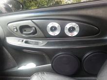 passenger side door
2 tweeters
3 8's
1 in factory and 2 on lower side