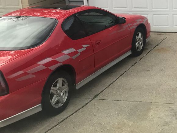 Can’t believe this is the only pic , I will get more ,when I bought it they had a party snacks ballon’s open double doors and drove it out for pictures, right now I have strobes up front and reverse lights, working on modifying a spoiler for lights , like to find one of those roof spoilers . Iam retired, just sold my 74 z of 43 years and 04 vette , crappy health, so my monte ! Thanks all 