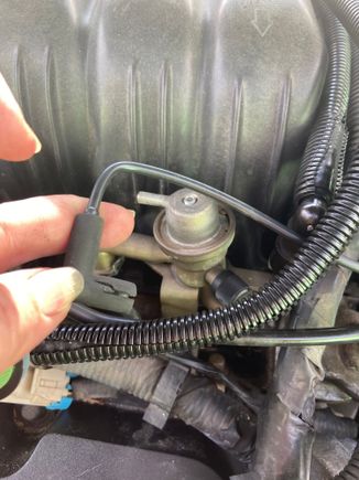 Would have never seen this if I hadn’t removed it for the throttle body gasket.  It was on the under side.  $6 for a new vac line elbow in a multi pack until the new harness comes in.  