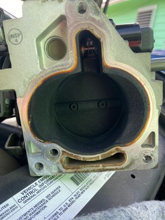 89k on this throttle body- make sure you remove all the sensors before you clean it.  Just a rag toothbrush and throttle body cleaner.  Take a razor blade to remove any deposits for a good seal to new gasket