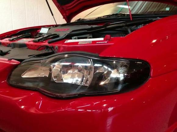 Black housed Headlights, LED Switchbacks, blacked out orange reflector