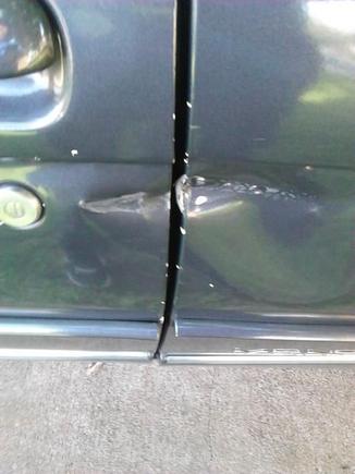 Better picture of where the bus backed into me...