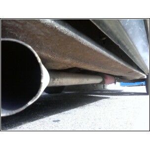 Cheep cherry bomo off y pipe and so stock exhaust exting the side