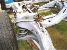 This is part of a '00 Dodge Dakota frame, suspension steering etc. It was grafted on and fish plated for added strength. Difference in the frames was less than 1/4 inch in box size. Metal was added and messaged to fit.