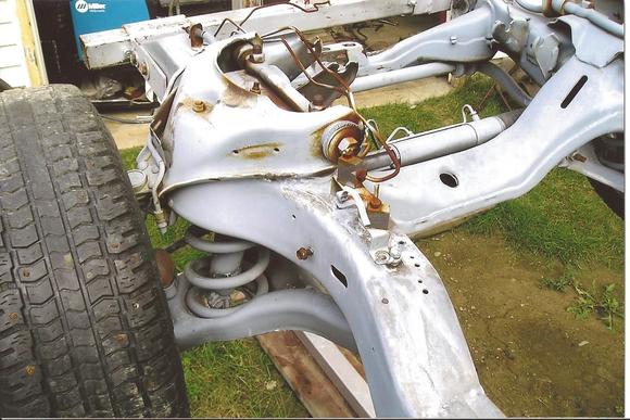 This is part of a '00 Dodge Dakota frame, suspension steering etc. It was grafted on and fish plated for added strength. Difference in the frames was less than 1/4 inch in box size. Metal was added and messaged to fit.