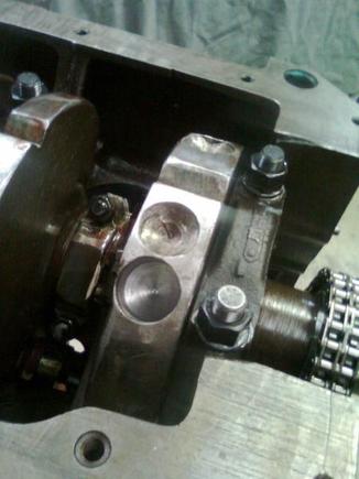 quite a lot of metal was removed from crank by me with angle grinder ,   piston &amp; pin was 80 grams lighter per piston than std before balancing ,   more was taken from rods also , then 4 deep holes were drilled &amp; more ground off the webs in the balancing process . I'd say at least 2-3 lbs lighter rotating Assembly .