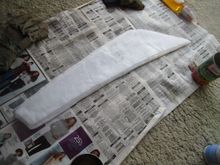 Masonite with three layers of polyester medium-weight batting glued in decreasing sizes