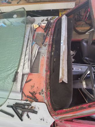 Finally pulled the front glass.  Just needs the rear glass out and i can put the body in primer.