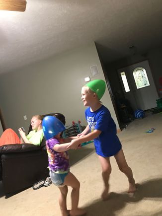 And a typical evening around the house. They’re wearing giant plastic Easter eggs.