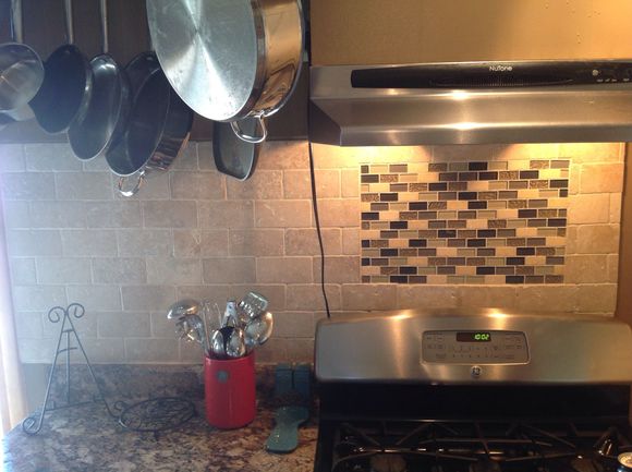 Backsplash is complete. Ran out of grout so couldn't finish til last night.  We tried to keep it rarely simple, save a few bucks that way.  Kitchen renovation is finally 100%.
