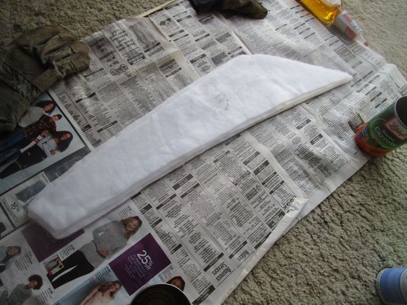 Masonite with three layers of polyester medium-weight batting glued in decreasing sizes