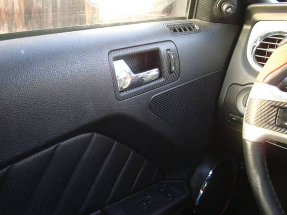 Driver Door Panel
Mods:
- Carbon Fiber Wrap
- Speakers