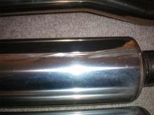 Small ding on rear muffler