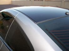 close up of black roof and window tint